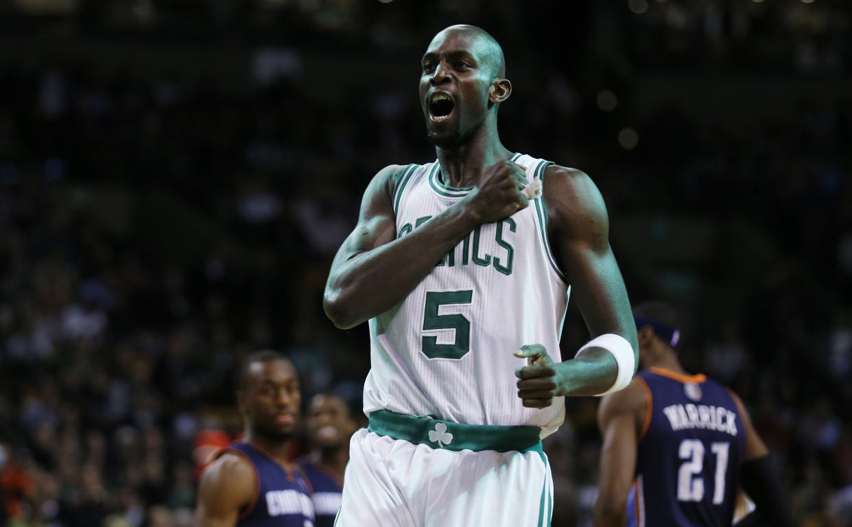 Boston Celtics power forward Kevin Garnett (5) facing the Charlotte Bobcats in the first quarter of an NBA basketball game in Boston, Monday, Jan. 14, 2013. (AP Photo/Charles Krupa)