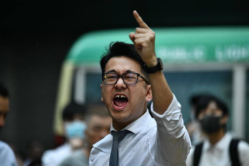 A man yells at police during a protest in Hong Kong's Central district on November 11, 2019. | ANTHONY WALLACE—AFP via Getty Images