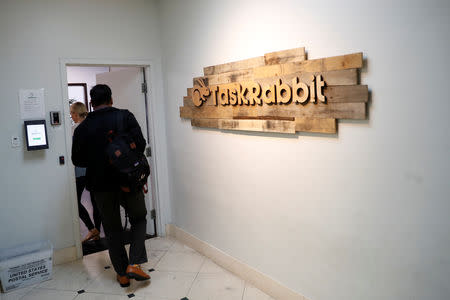 Workers enter the TaskRabbit office in San Francisco, California, U.S., September 13, 2018. Picture taken September 13, 2018. REUTERS/Stephen Lam