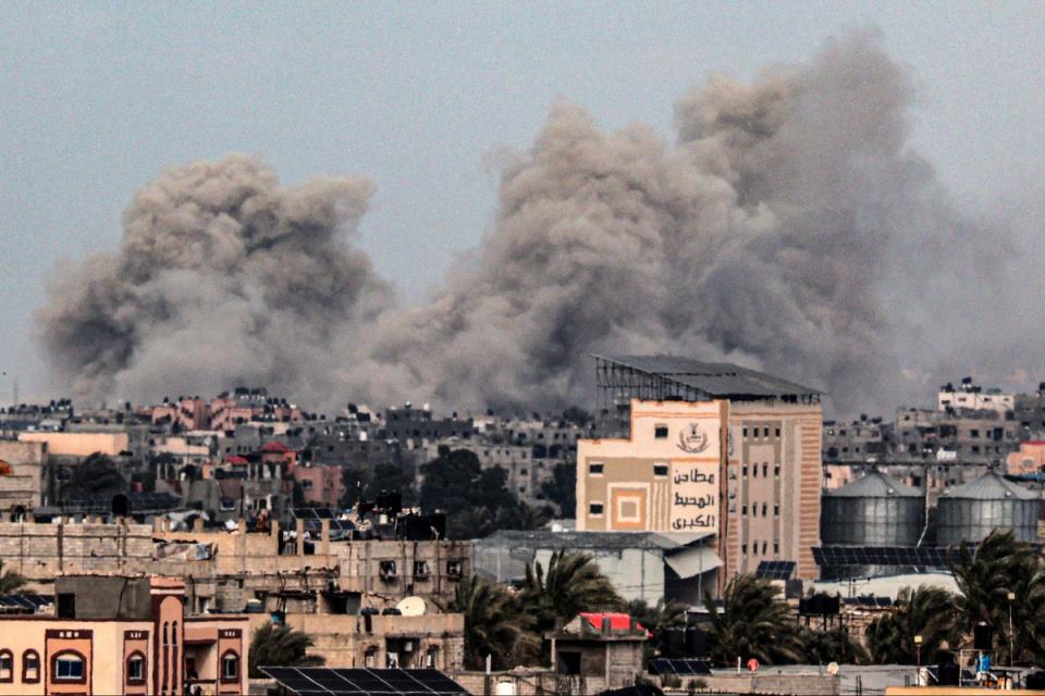 Smoke rises from southern Gaza in the wake of Israeli airstrikes last week (AFP)