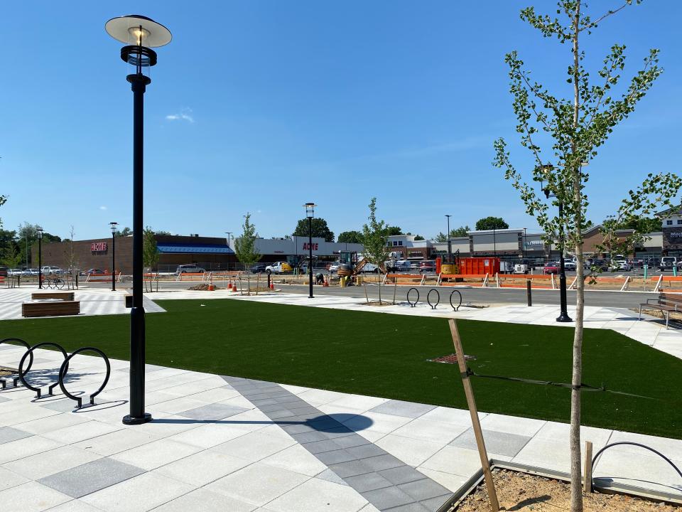 Common area in the middle of The Grove at Newark, a mixed-use community under construction at the former College Square in Newark. This area is between the existing shops and the apartments under construction.