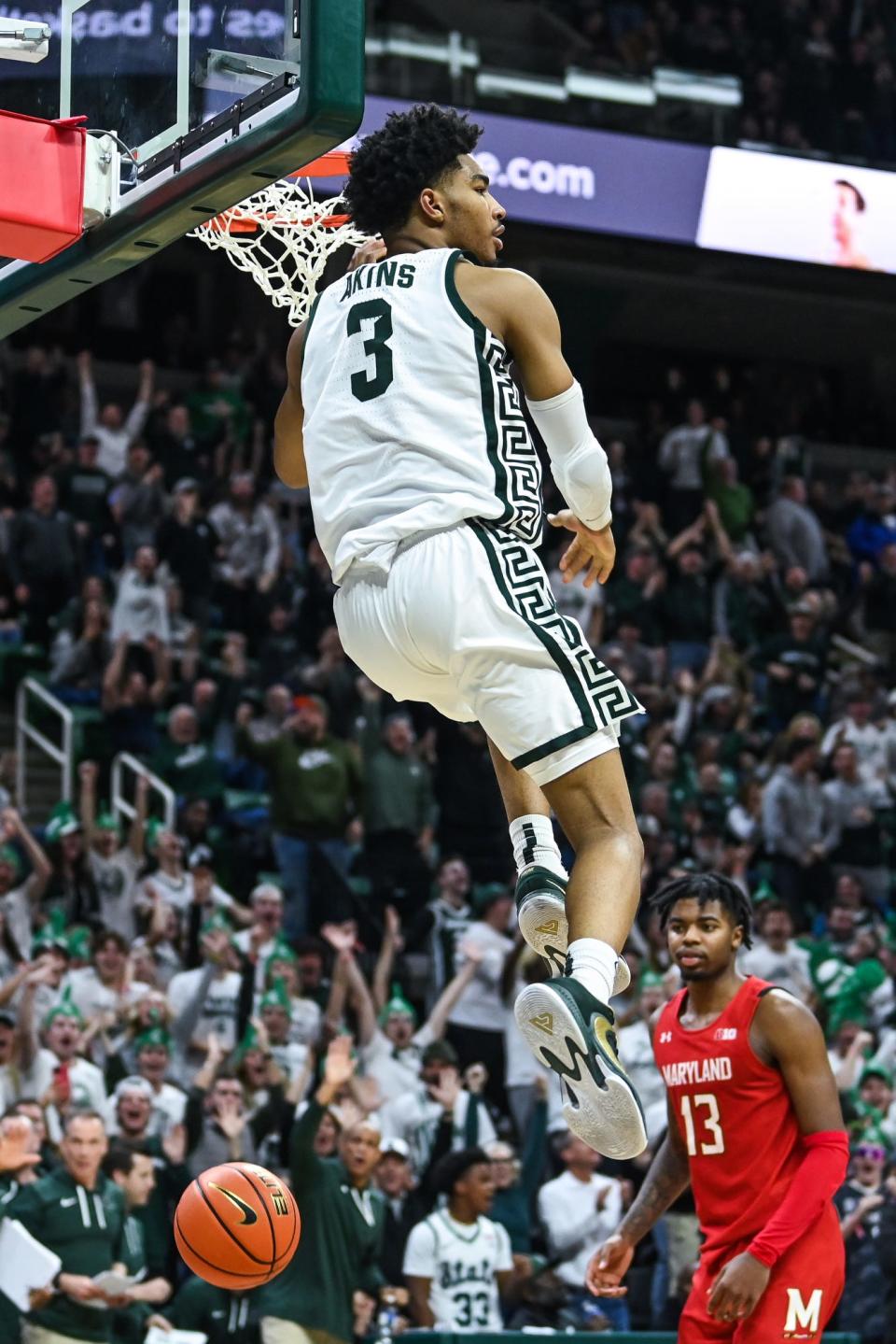 Michigan State's Jaden Akins celebrates after dunking against Maryland during the second half on Tuesday, Feb. 7, 2023, at the Breslin Center in East Lansing.