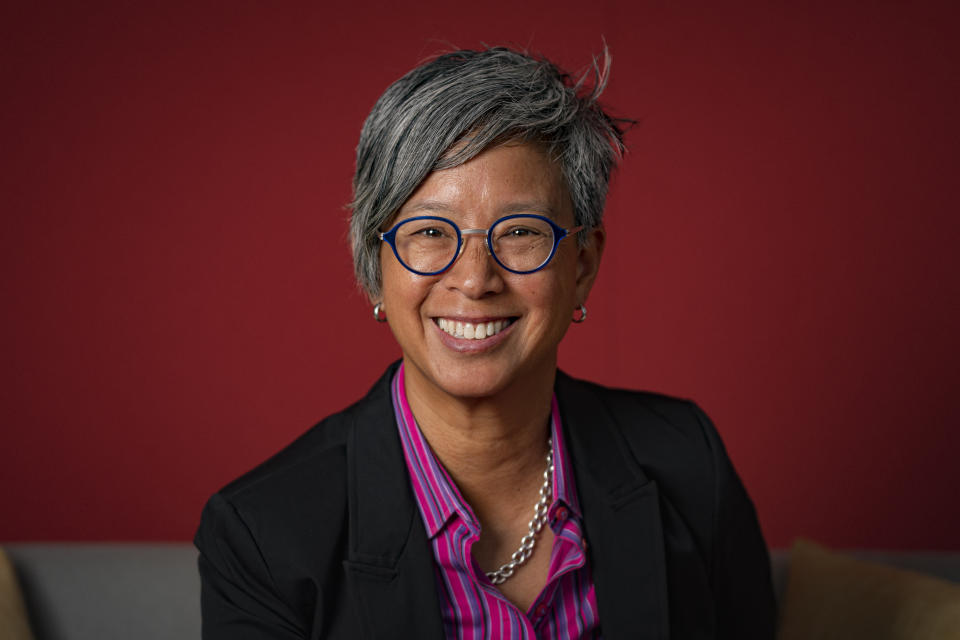 Candid CEO Ann Mei Chang poses for a photo at the nonprofits's headquarters on Wednesday, Jan. 31, 2024, in New York. Chang, CEO since 2021, believes her organization can help the philanthropic sector work more efficiently by making more data from donors and grantees available to the public. (AP Photo/Peter K. Afriyie)