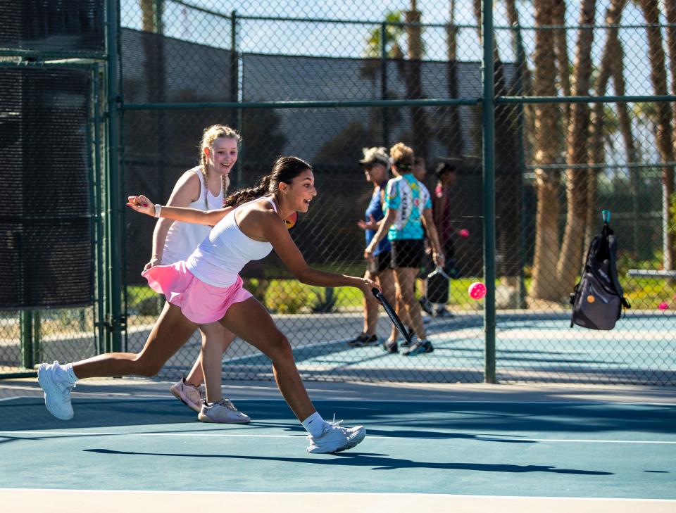 Xavier Prep tennis player Ava Samuel, 17, hits back to her opponents during the Pink Pickleball Charity Tournament at Mission Hills Country Club in Rancho Mirage, Calif., Saturday, Nov. 18, 2023.