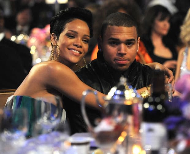 Rihanna and Chris Brown attend the GRAMMY Salute To Industry Icons honoring Clive Davis at the Beverly Hilton Hotel on Feb. 7, 2009, in Beverly Hills, California. Hours later, Brown would be arrested for assaulting Rihanna.<p><a href="https://www.gettyimages.com/detail/84688863" rel="nofollow noopener" target="_blank" data-ylk="slk:Kevin Mazur/Getty Images;elm:context_link;itc:0;sec:content-canvas" class="link ">Kevin Mazur/Getty Images</a></p>