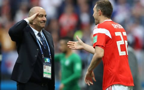 Russia coach Stanislav Cherchesov salutes Russia's Artem Dzyuba after he scored their third goal - Credit: REUTERS/Carl Recine