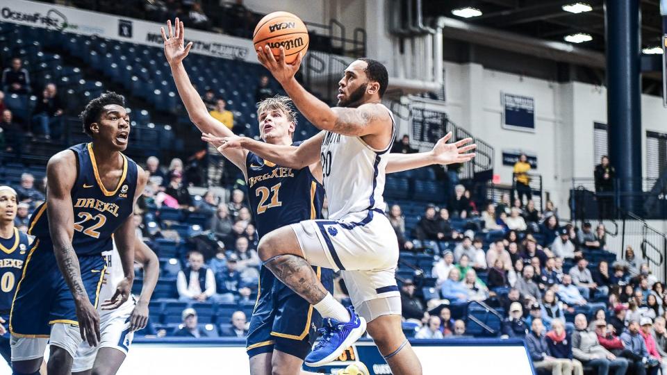 Monmouth's Tahron Allen drives against Drexel on Feb. 4, 2023 in West Long Banch