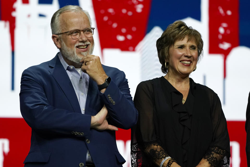 FILE - In this Wednesday, June 16, 2021 file photo, incoming Southern Baptist Convention President Ed Litton, left, and his wife, Kathy Litton, attend the annual Southern Baptist Convention meeting in Nashville, Tenn. Litton assumed his new role amid division in the convention over its future as well as issues of race, the role of women in the church and how to address sexual abuse in the church. (AP Photo/Mark Humphrey, File)