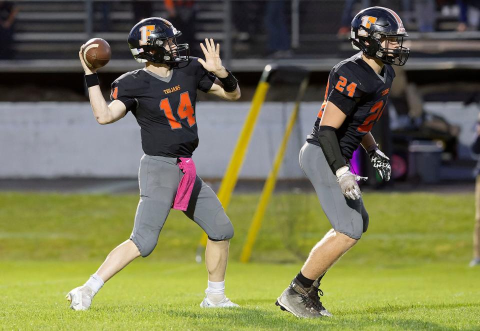 Fairfield quarterback Tate Allen looks downfield in Friday's 53-7 win over West Burlington-Notre Dame.