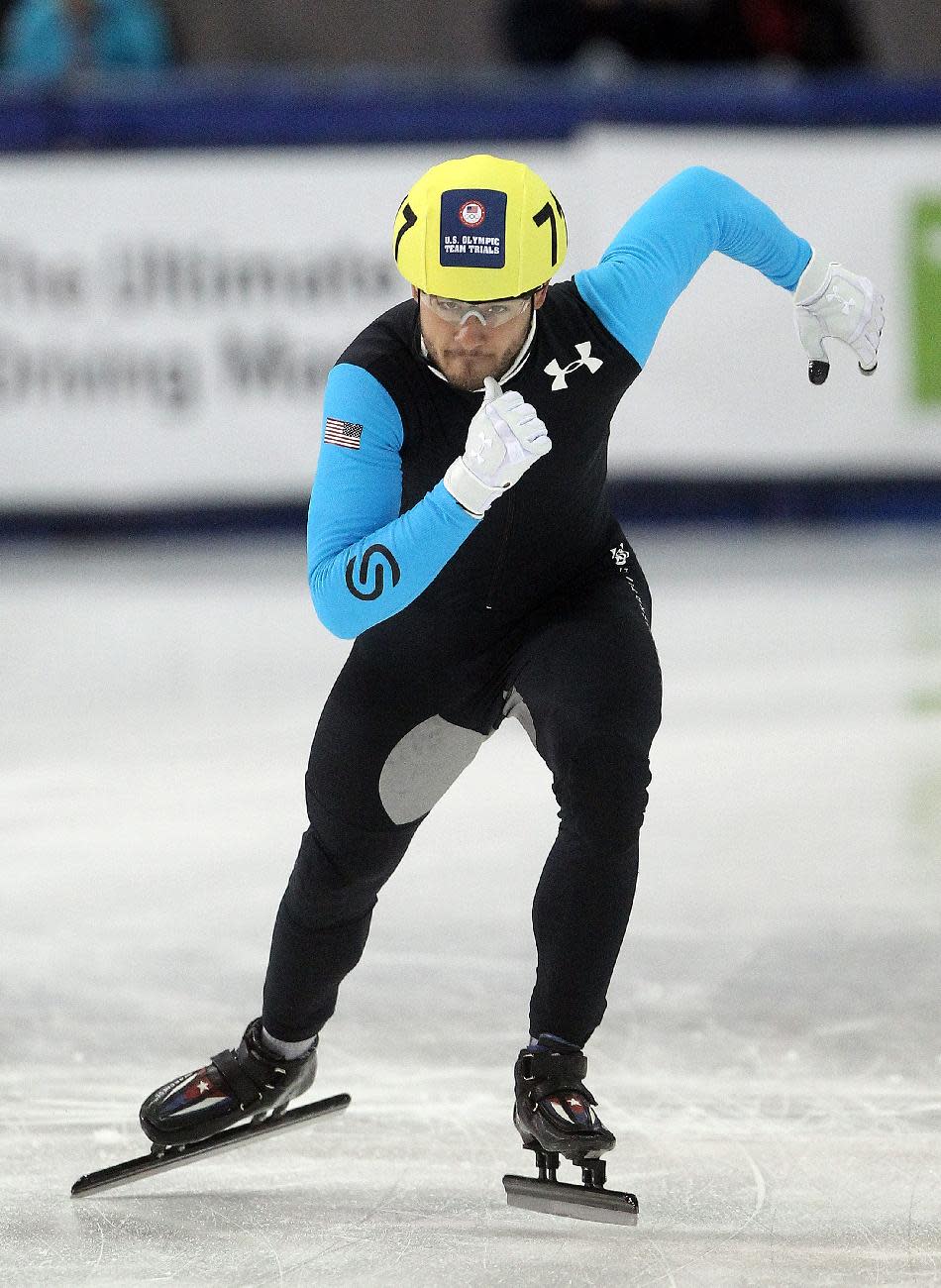 Eduardo Alvarez competes in the men's 1,000 meters during the U.S. Olympic short track speedskating trials on Sunday, Jan. 5, 2014, in Kearns, Utah. (AP Photo/Rick Bowmer)