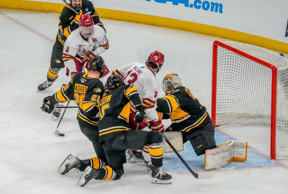 Boston College's Ryan Leonard scores the go-ahead goal in the second period past Michigan Tech goalie Blake Pietila, Friday, March 29, 2024 in the NCAA hockey regionals.
