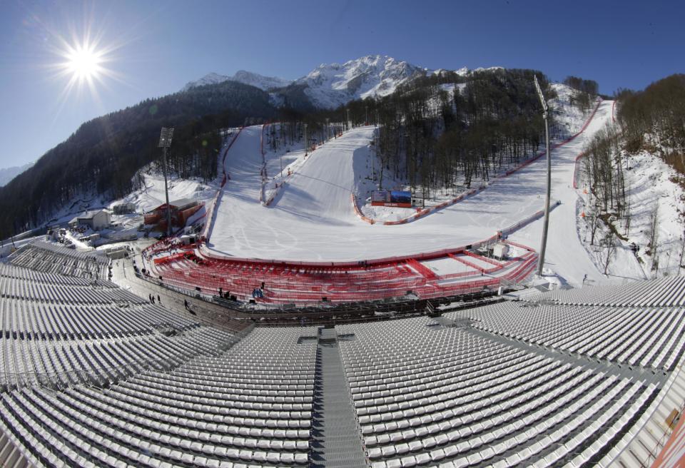 This image made with a fisheye lens shows the finish area of the Alpine ski course ahead of the Sochi 2014 Winter Olympics, Wednesday, Feb. 5, 2014, in Krasnaya Polyana, Russia. (AP Photo/Gero Breloer)