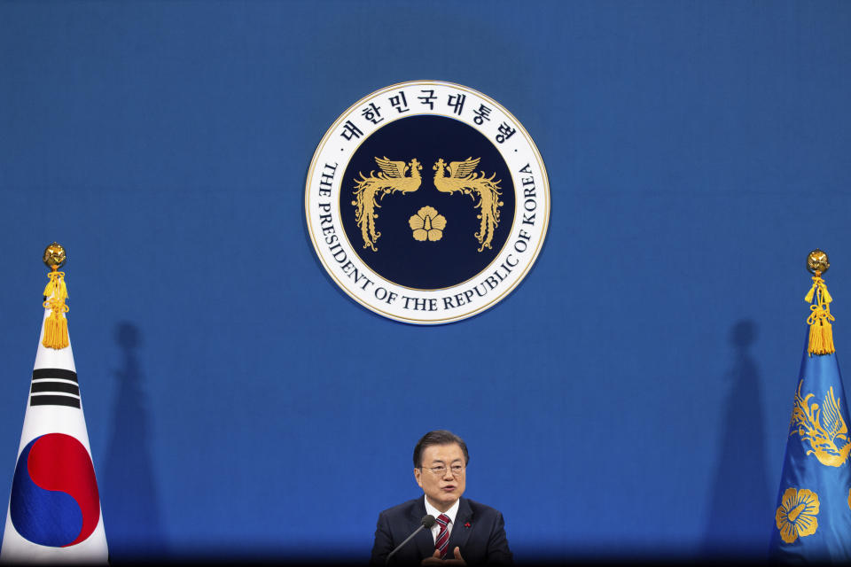 South Korean President Moon Jae-in speaks during an on-line New Year press conference with local and foreign journalists at the Presidential Blue House in Seoul, South Korea Monday, Jan. 18, 2021. (Jeon Heon-kyun/Pool Photo via AP)