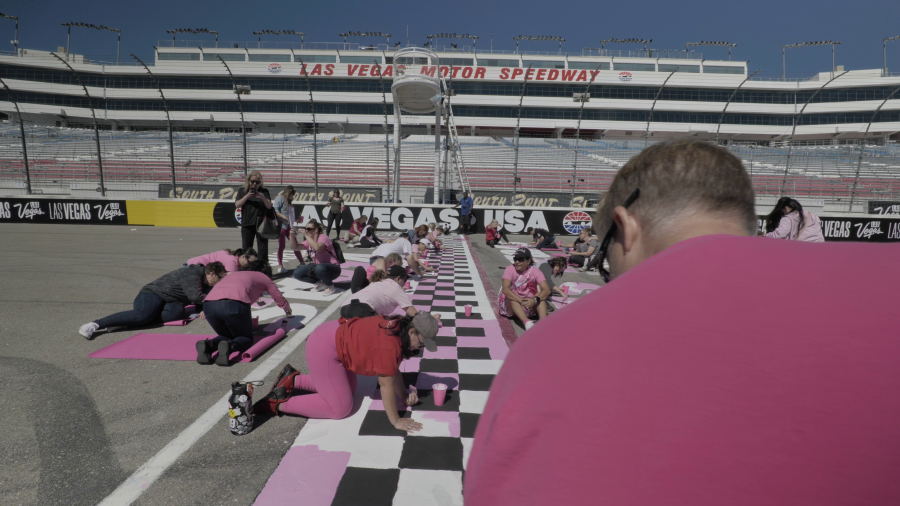 Survivors painted the start/finish line pink in honor of National Breast Cancer Awareness month for the Oct. 14-15 NASCAR Weekend. (JB Public Relations)