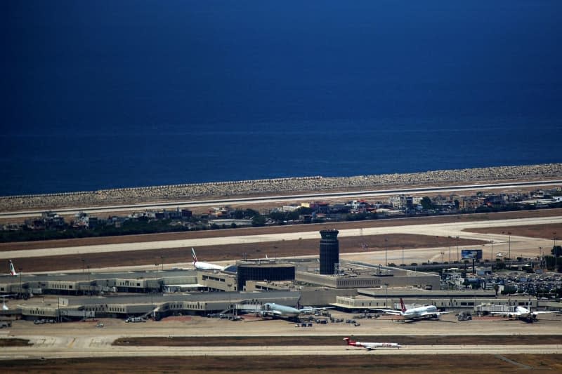 Planes are seen on the runway at Beirut Rafiq Hariri International Airport. A growing number of flights have been canceled or suspended at Beirut's only commercial airport, as the US, UK, Australia, Sweden, France, Italy, Canada, South Korea, Saudi Arabia, and Jordan urge their citizens to flee Lebanon as soon as possible as fears of an all-out war between Israel and pro-Iranian Hezbollah grow. Marwan Naamani/ZUMA Press Wire/dpa