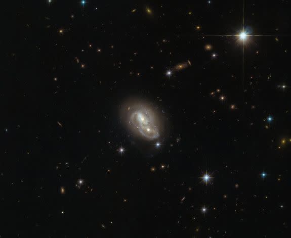 A full view of the unusual galaxy IRAS 06076-2139 seen by the Hubble Space Telescope.