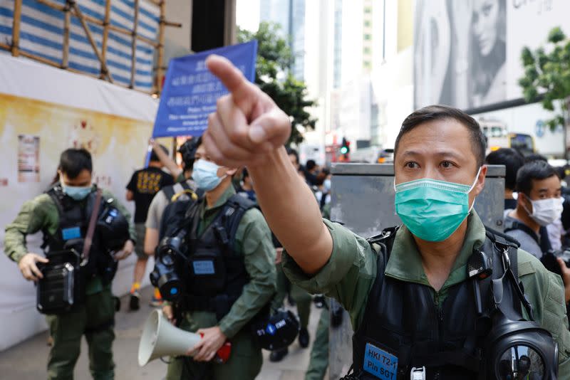 Police ask people to leave to avoid mass gathering on Chinese National Day in Hong Kong