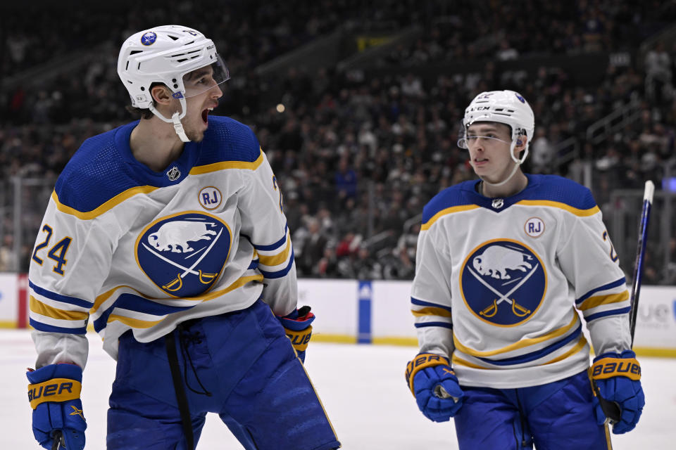 Buffalo Sabres center Dylan Cozens (24) celebrates his goal against the Los Angeles Kings with right wing Jack Quinn during the third period of an NHL hockey game in Los Angeles, Wednesday, Jan. 24, 2024. (AP Photo/Alex Gallardo)