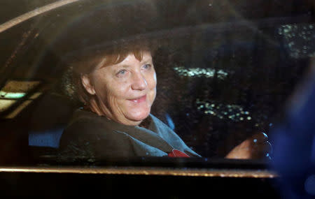 German Chancellor Angela Merkel of the Christian Democratic Union (CDU) leaves the German Parliamentary Society after exploratory talks about forming a new coalition government in Berlin, Germany, November 17, 2017. REUTERS/Hannibal Hanschke