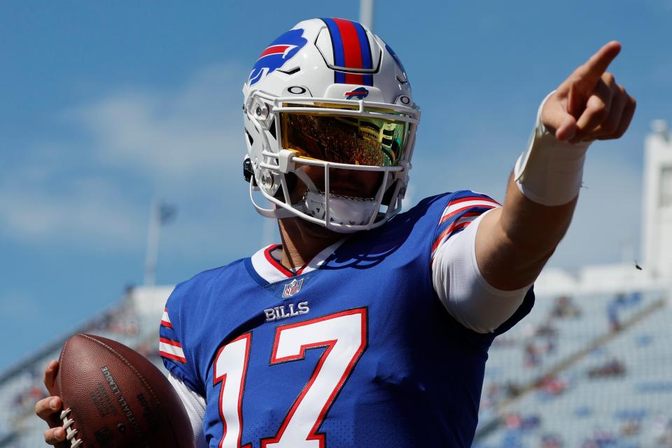 Buffalo Bills quarterback Josh Allen gestures while warming up prior to a preseason NFL football game against the Indianapolis Colts, Saturday, Aug. 13, 2022, in Orchard Park, N.Y. (AP Photo/Jeffrey T. Barnes)