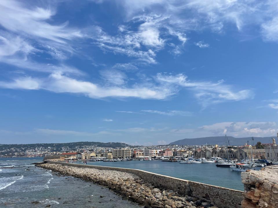 view of chania harbor on the ocean in create greece