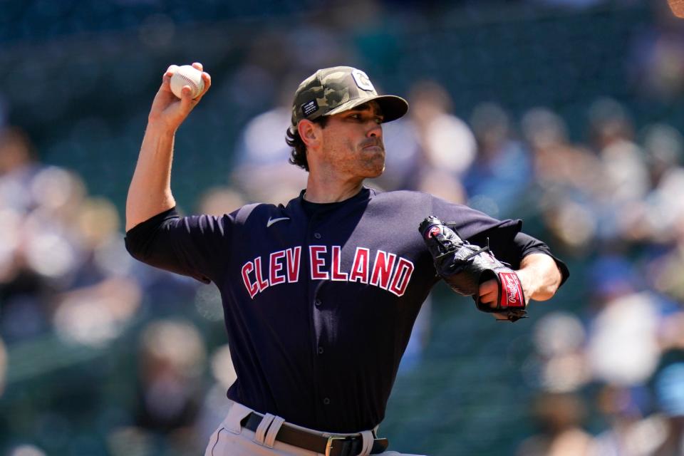 Cleveland Indians starting pitcher Shane Bieber throws against the Seattle Mariners in the first inning of a baseball game Sunday, May 16, 2021, in Seattle.