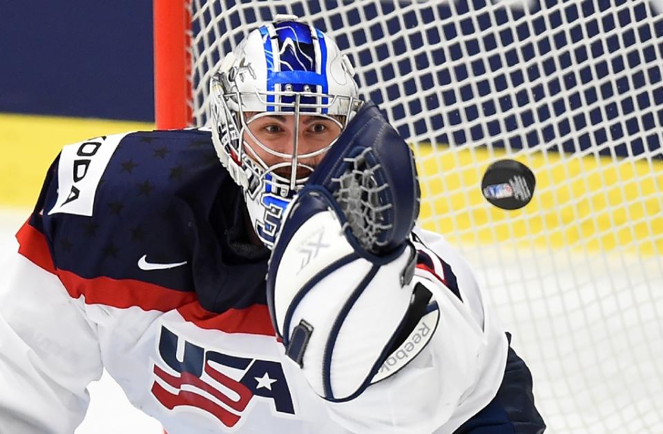 US goalkeeper Connor Hellebuyck eyes the puck during the group B preliminary round match Slovenia vs USA at the 2015 IIHF Ice Hockey World Championships on May 10, 2015 (AFP Photo/Joe Klamar)