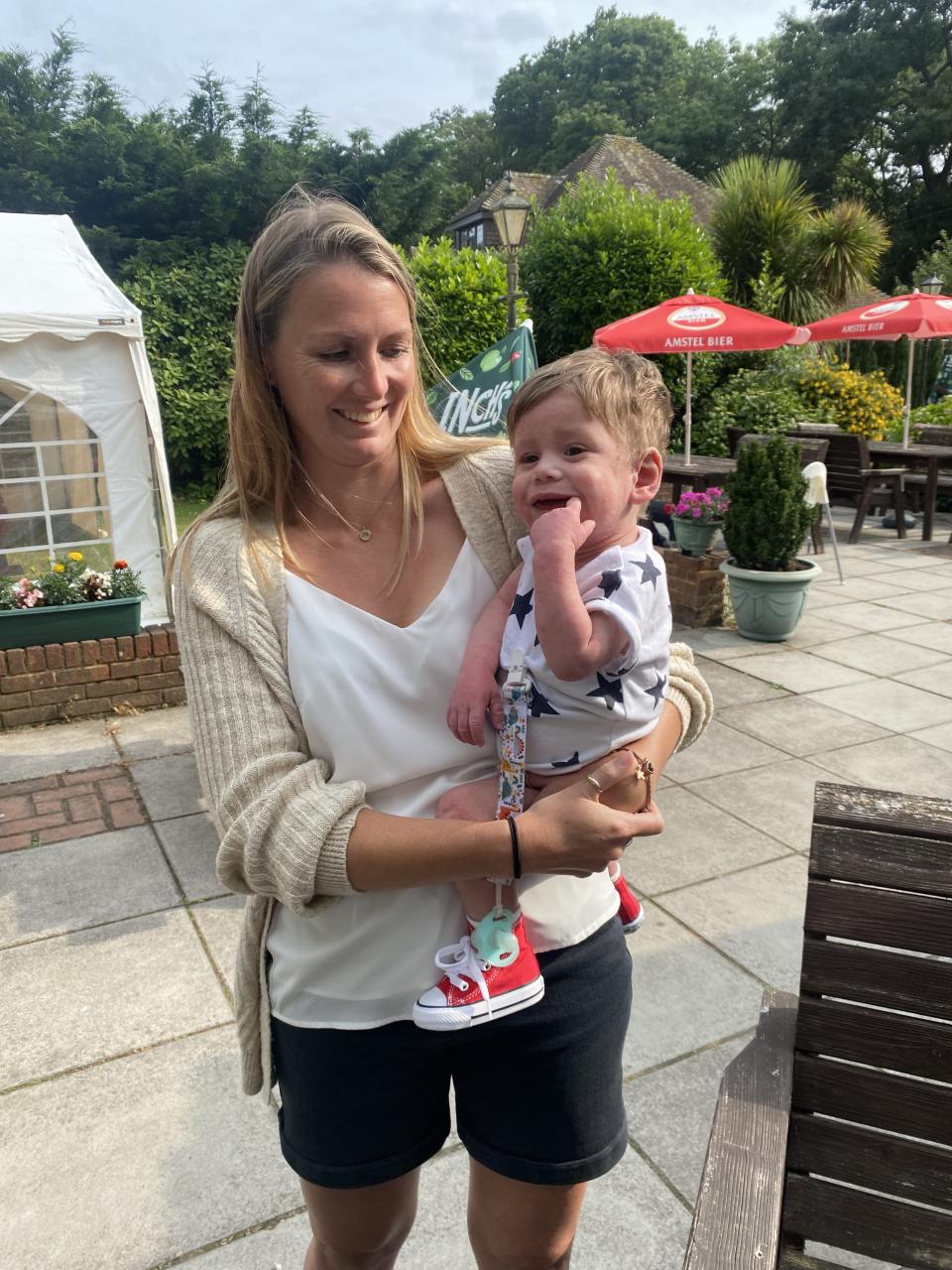 Tommy with his mum's best friend Kayleigh Taylor, who donated part of her liver to him. (Lauren Beckett/SWNS)