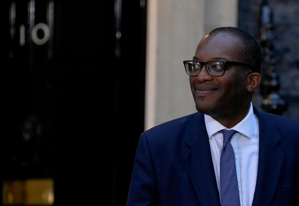 Chancellor of the Exchequer Kwasi Kwarteng walks outside Number 10 Downing Street.