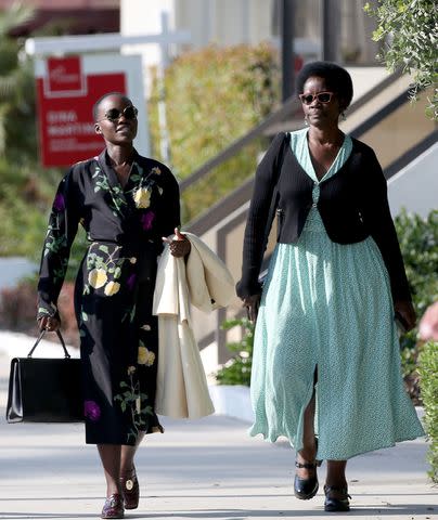 <p>SplashNews</p> Lupita Nyong'o (left) and her mother Dorothy