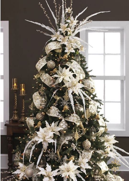 Oversize white poinsettias and an explosion of feathers