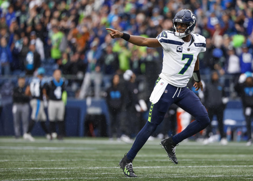 Sep 24, 2023; Seattle, Washington, USA; Seattle Seahawks quarterback <a class="link " href="https://sports.yahoo.com/nfl/players/26662" data-i13n="sec:content-canvas;subsec:anchor_text;elm:context_link" data-ylk="slk:Geno Smith;sec:content-canvas;subsec:anchor_text;elm:context_link;itc:0">Geno Smith</a> (7) celebrates after converting a two-point conversion against the <a class="link " href="https://sports.yahoo.com/nfl/teams/carolina/" data-i13n="sec:content-canvas;subsec:anchor_text;elm:context_link" data-ylk="slk:Carolina Panthers;sec:content-canvas;subsec:anchor_text;elm:context_link;itc:0">Carolina Panthers</a> during the fourth quarter at Lumen Field. Mandatory Credit: Joe Nicholson-USA TODAY Sports