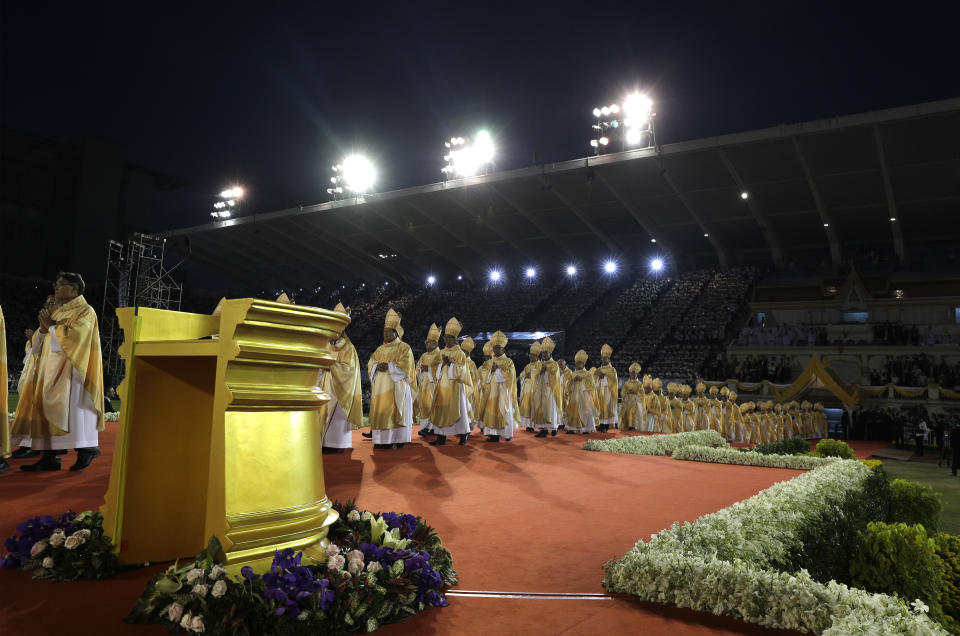 Local clergy arrive as Pope Francis celebrates a Mass at National Stadium, Thursday, Nov. 21, 2019, in Bangkok, Thailand. (AP Photo/Gregorio Borgia)