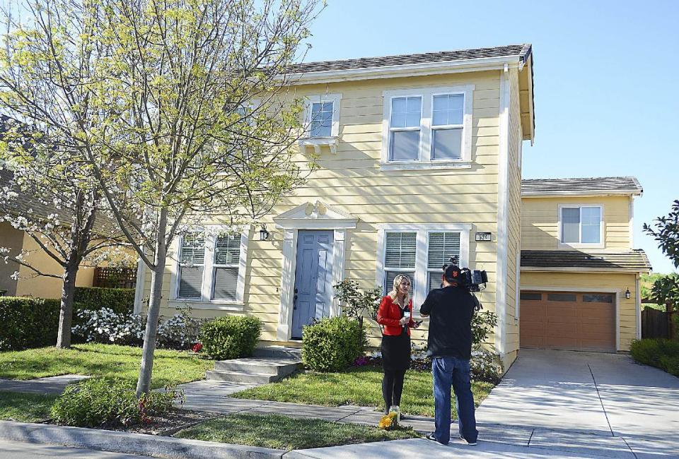 FILE - In this March 25, 2015 file photo, a news crew reports in front of the home of Denise Huskins, who was abducted in Vallejo, Calif. Matthew Muller, a disbarred Harvard University-trained attorney, faces decades in prison when he is sentenced Thursday, March 16, 2017, for kidnapping Huskins in a scheme so elaborate and bizarre that police in California initially dismissed it as a hoax. (Chris Riley/Vallejo Times-Herald via AP, file)