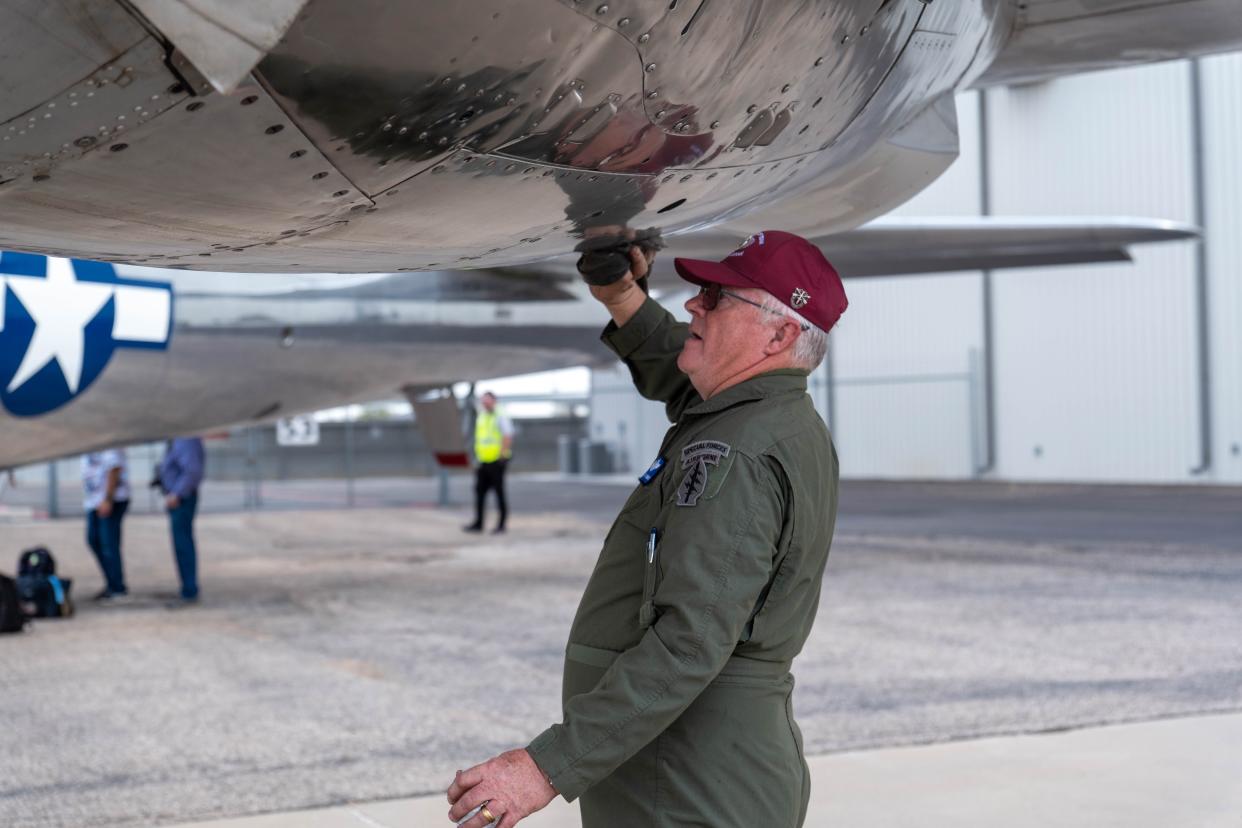 A crewmember of the B-29 Doc looks over the aircraft at the Texas Air and Space Museum at 10001 American Drive in Amarillo in this 2023 file photo.