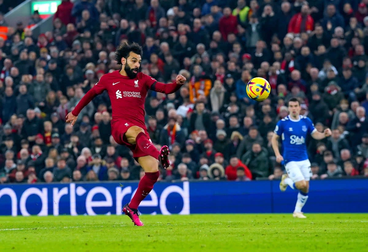 Mohamed Salah lifts the ball past Pickford for Liverpool’s opener  (PA)