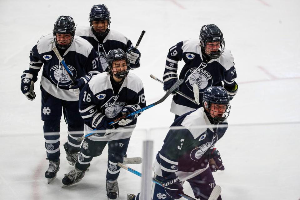 Bloomfield Hills Cranbrook Kingswood players celebrate a goal against East Grand Rapids during the second period of MHSAA Division 3 hockey final at USA Hockey Arena in Plymouth on Saturday, March 9, 2024.
