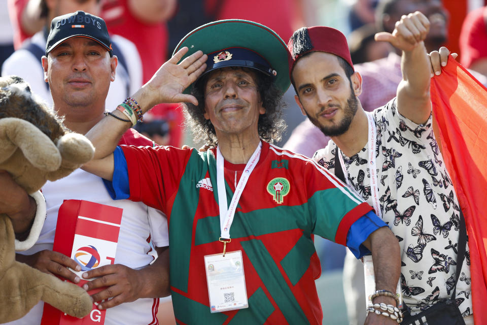 Morocco fans cheer before the African Cup of Nations group D soccer match between Morocco and Namibia in Al Salam Stadium in Cairo, Egypt, Sunday, June 23, 2019. (AP Photo/Ariel Schalit)