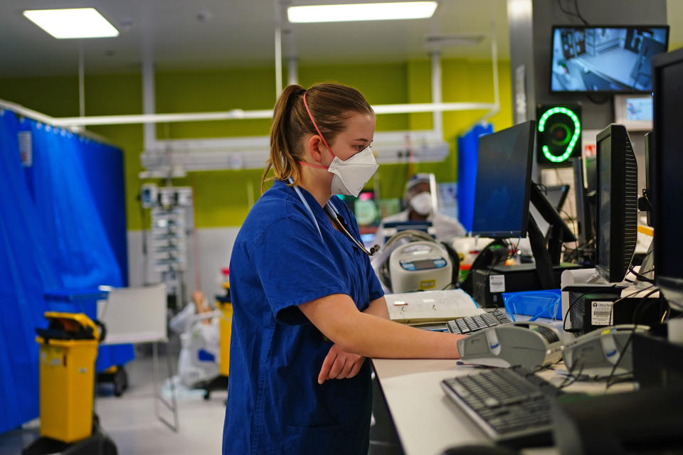 A medical staff member wearing an FFP3 face mask in a critical care unit at King's College Hospital, in south east London. Picture date: Tuesday December 21, 2021. (Photo by Victoria Jones/PA Images via Getty Images)