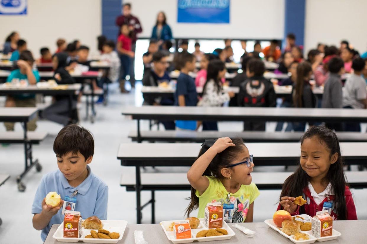 Students eat lunch in the cafeteria on Thursday, Oct. 26, 2017, at Travis Elementary in Corpus Christi.