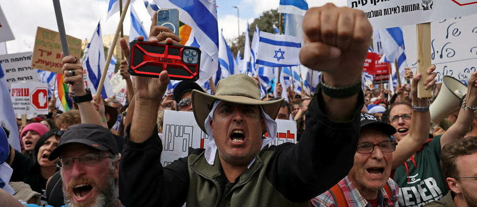 Manifestation devant le parlement israélien contre la réforme controversée du système judiciaire, à Jérusalem, le 27 mars 2023.   - Credit:Hazem Bader/AFP