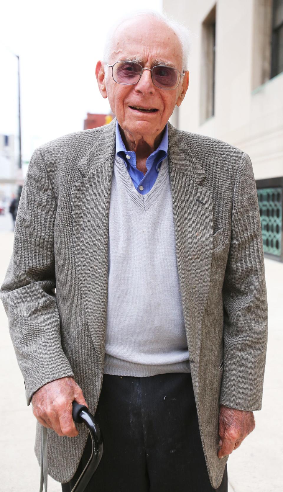 Avern Cohn, born July 23, 1924, a senior United States District Judge for the United States District Court for the Eastern District of Michigan in Detroit walks along Fort Street returning to his chambers from lunch Wednesday, May 11, 2016.