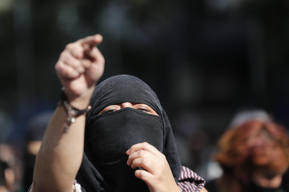 A demonstrator shouts during a march supporting abortion rights in Mexico City, Monday, Sept. 28, 2020. (AP Photo/Marco Ugarte)