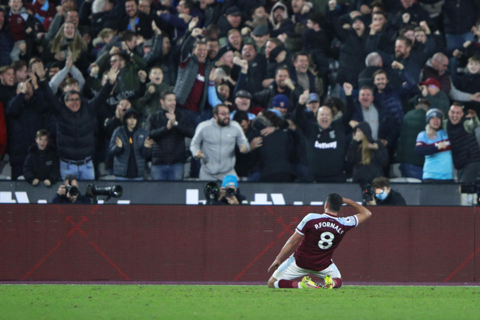 West Ham's Pablo Fornals celebrates after scoring his side's 2nd goal during the English Premier League soccer match between West Ham United and Liverpool at the London stadium in London, England, Sunday, Nov. 7, 2021. (AP Photo/Ian Walton)