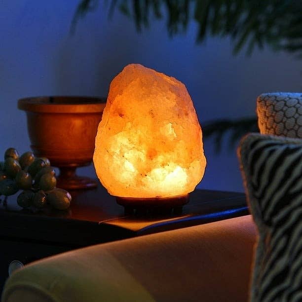 A salt lamp glows