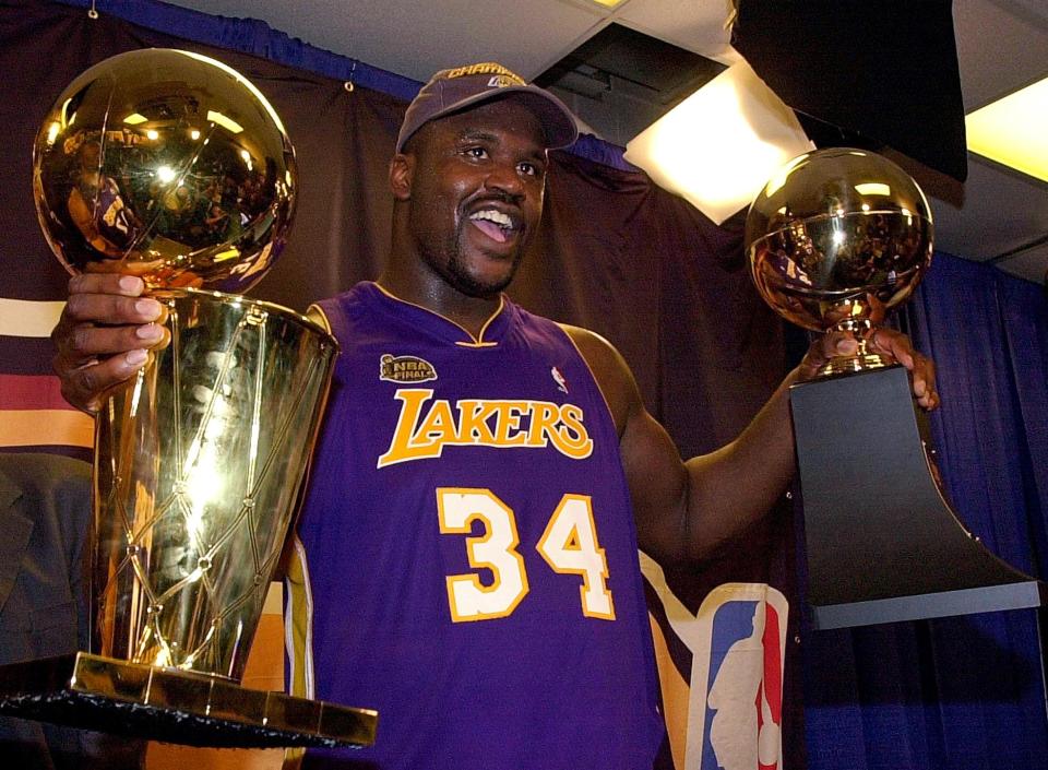 Shaquille O'Neal after winning his second NBA championship and Finals MVP in 2001. (Stan Honda/AFP via Getty Images)