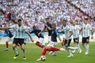 <p>Kylian Mbappe puts France back in front with a left-footed strike in a ding-dong Round of 16 encounter with Argentina </p>