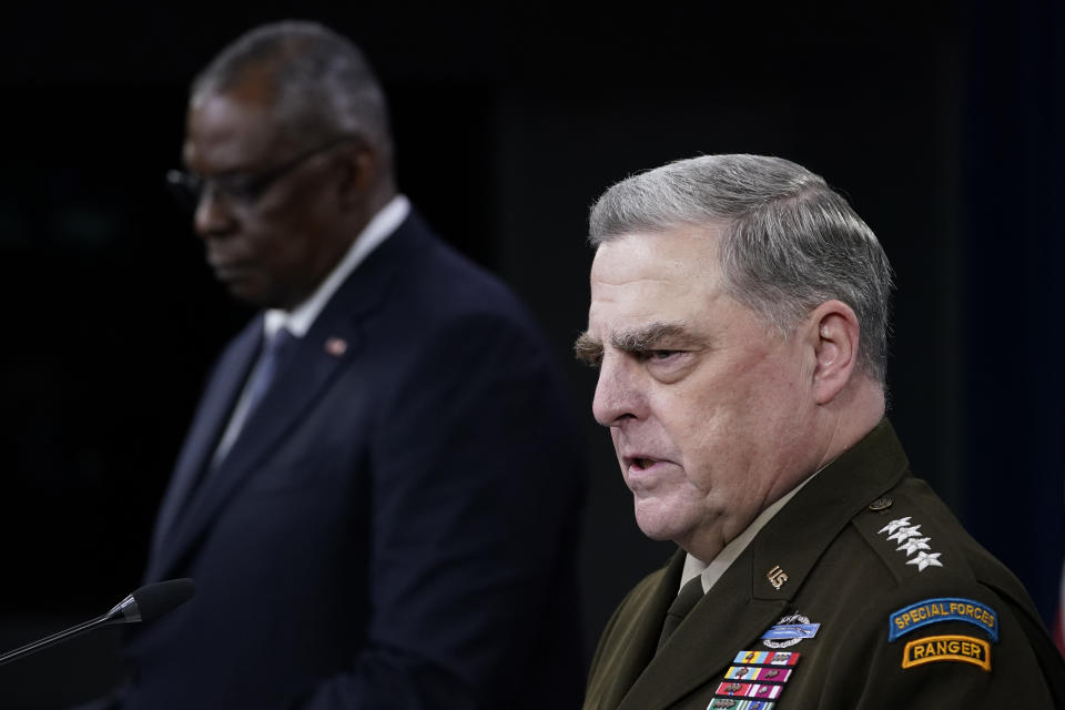 Joint Chiefs of Staff Gen. Mark Milley, right, answers a question during a briefing with Secretary of Defense Lloyd Austin, left, at the Pentagon in Washington, Wednesday, Sept. 1, 2021, about the end of the war in Afghanistan. (AP Photo/Susan Walsh)