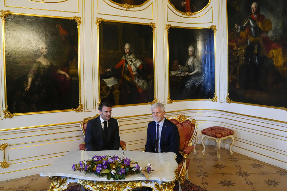 French President Emmanuel Macron, left, speaks during talks with his Czech Republic's counterpart Petr Pavel at the Prague Castle in Prague, Czech Republic, Tuesday, March 5, 2024. Macron is on a one-day official visit to Czech Republic. (AP Photo/Petr David Josek)
