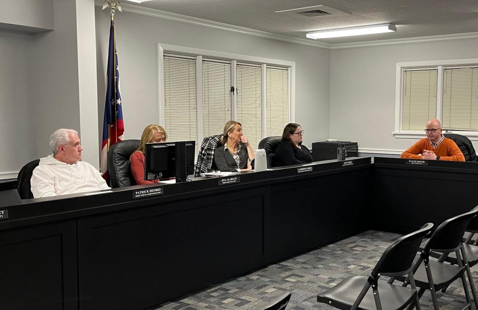 North Canton's law director, Wayne Boyer, right, on Feb. 7 explains to North Canton council the city's legal situation when it comes to two proposed levy increases that the Stark County Board of Elections declined to certify for the May 2 ballot.